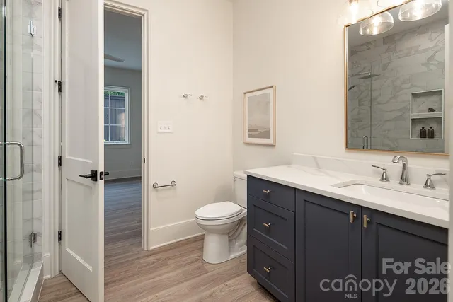 a white bath tub sitting next to a white sink