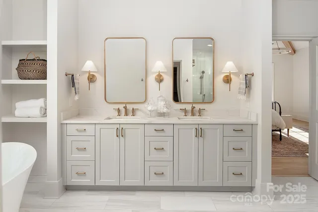 a bathroom with a double vanity sink and a mirror