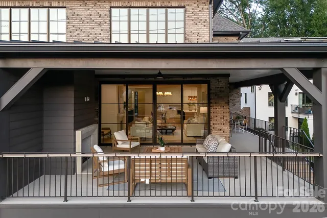 a view of a house with a garden and stairs
