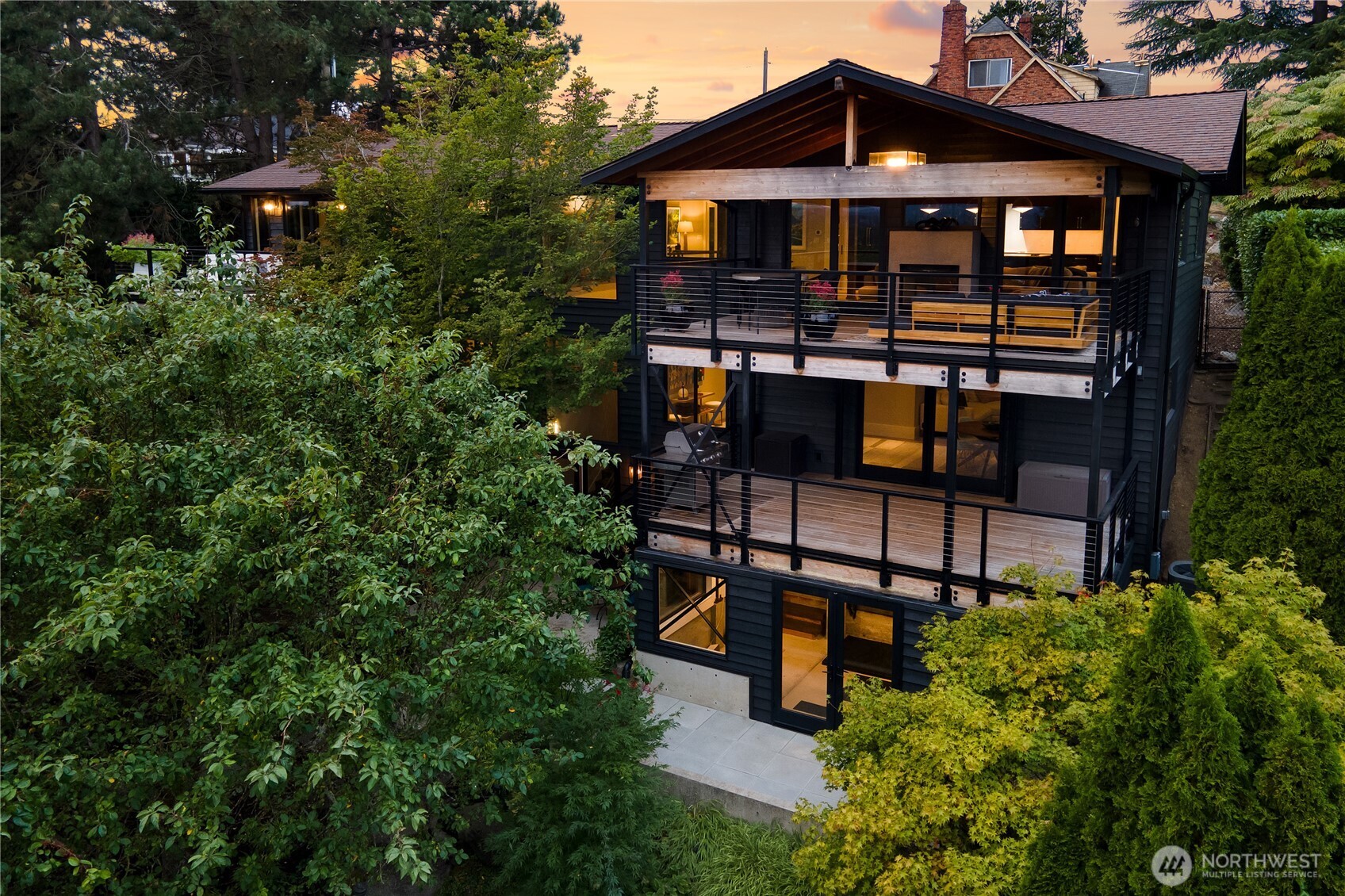 aerial view of a house with a yard