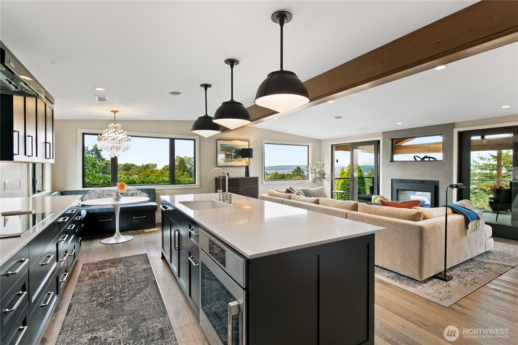 2816 South Hudson Street Seattle, WA 98108 - Photo 13 of 40 a kitchen with stainless steel appliances granite countertop a stove and a large window
