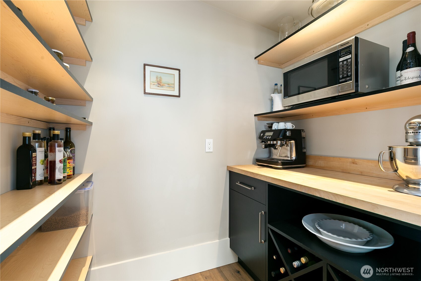 2816 South Hudson Street Seattle, WA 98108 - Photo 16 of 40 a kitchen with a sink a stove and cabinets