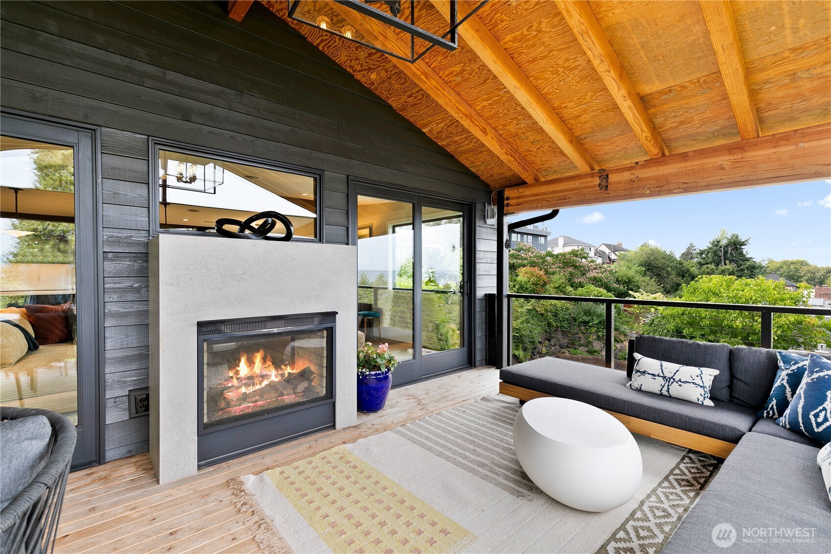 2816 South Hudson Street Seattle, WA 98108 - Photo 17 of 40 a outdoor space with a couch and a fireplace