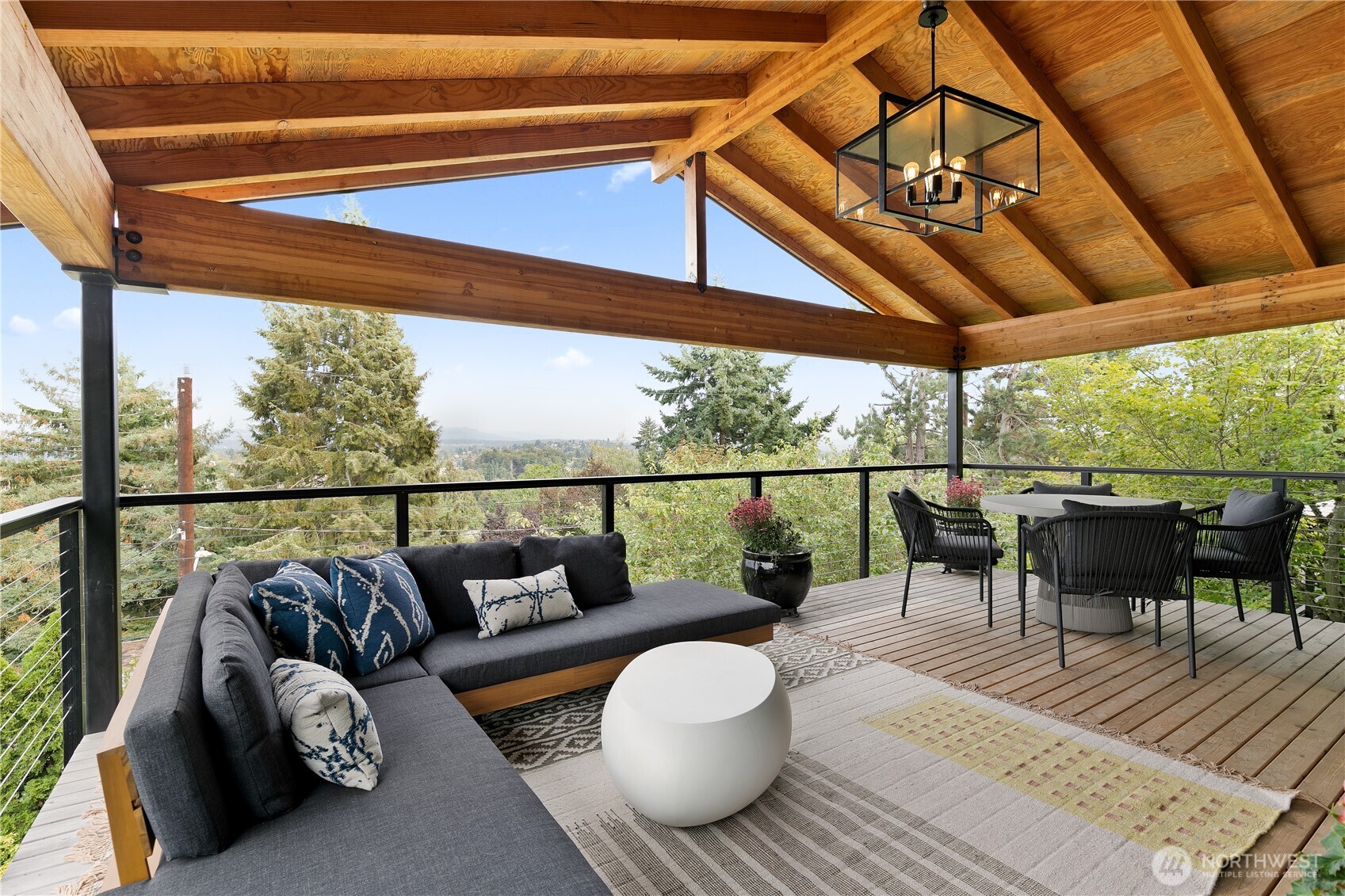 2816 South Hudson Street Seattle, WA 98108 - Photo 18 of 40 a balcony with furniture and a view of the ocean