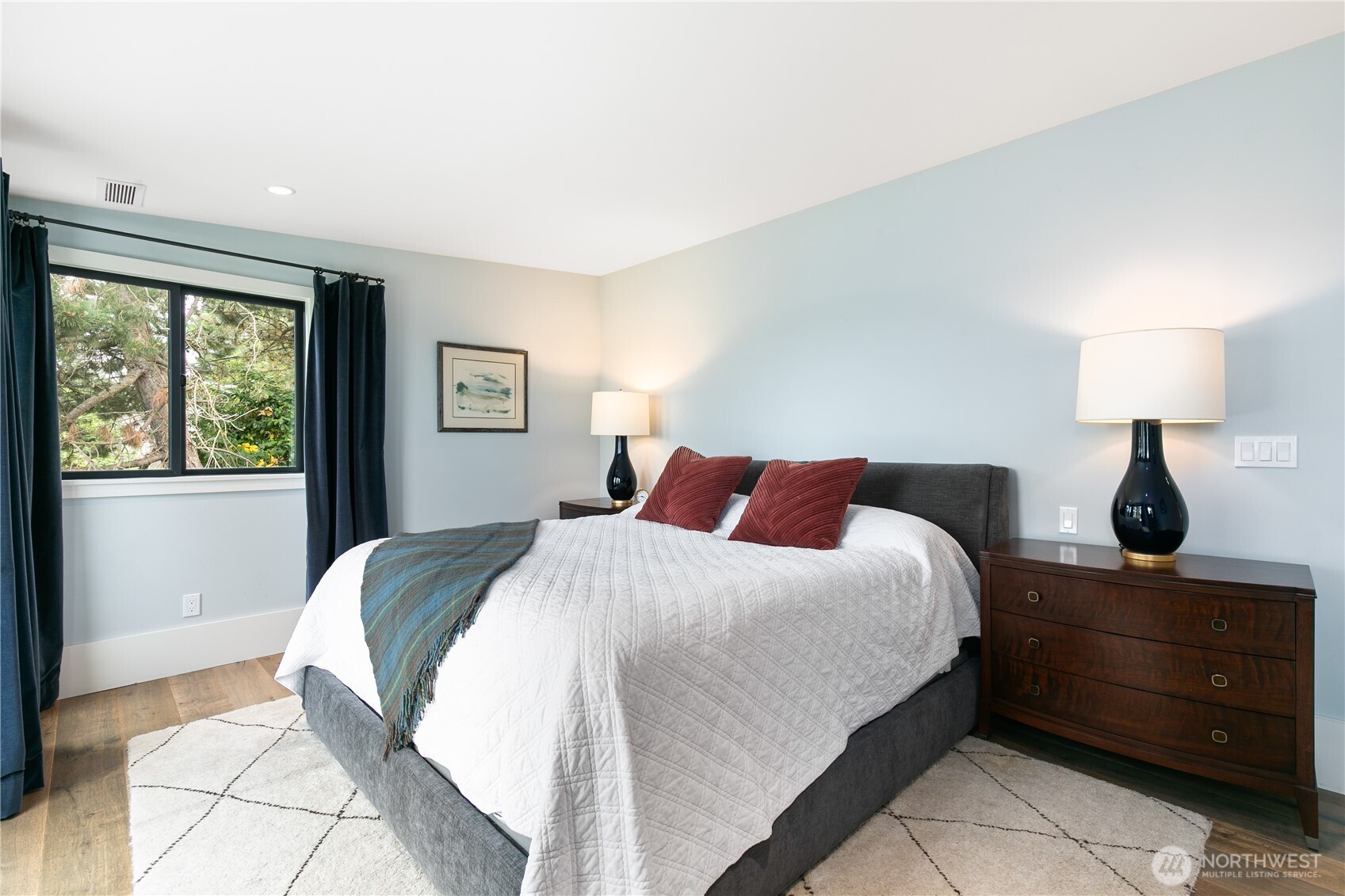 2816 South Hudson Street Seattle, WA 98108 - Photo 21 of 40 a bedroom with a bed and a window