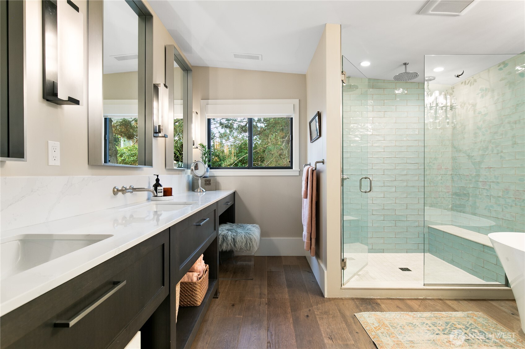 2816 South Hudson Street Seattle, WA 98108 - Photo 25 of 40 a bathroom with a double vanity sink a toilet a mirror and shower