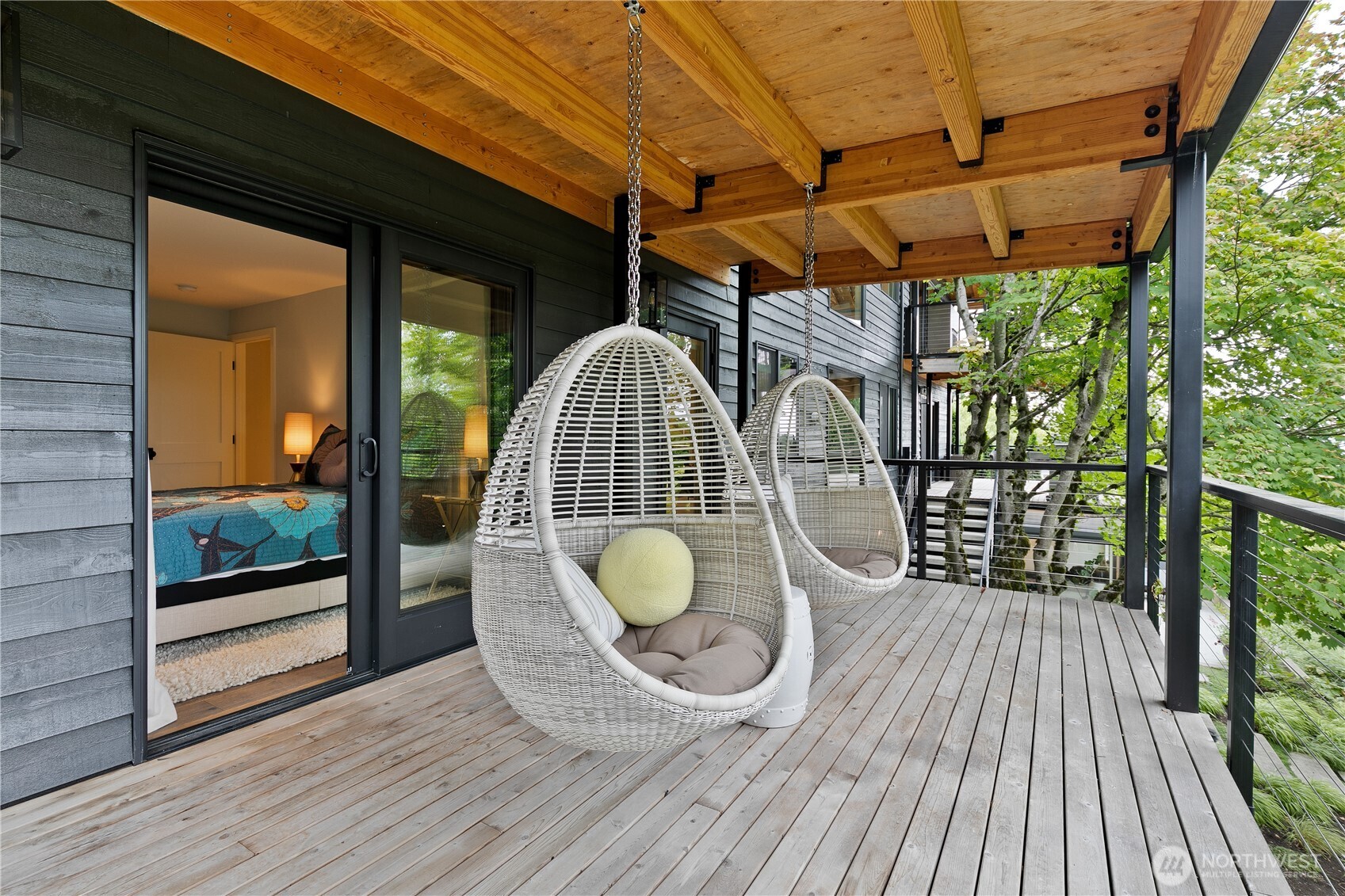 2816 South Hudson Street Seattle, WA 98108 - Photo 31 of 40 a view of a balcony with wooden floor and iron stairs