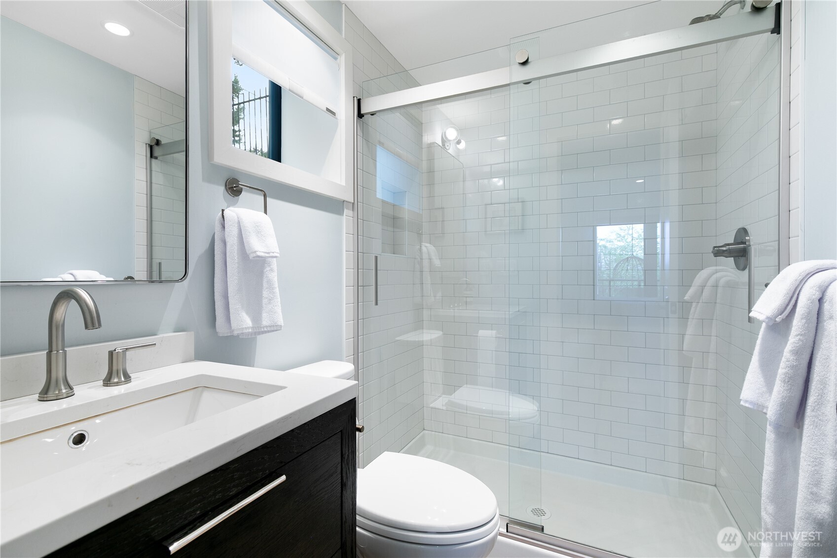 2816 South Hudson Street Seattle, WA 98108 - Photo 32 of 40 a bathroom with a sink a toilet and shower
