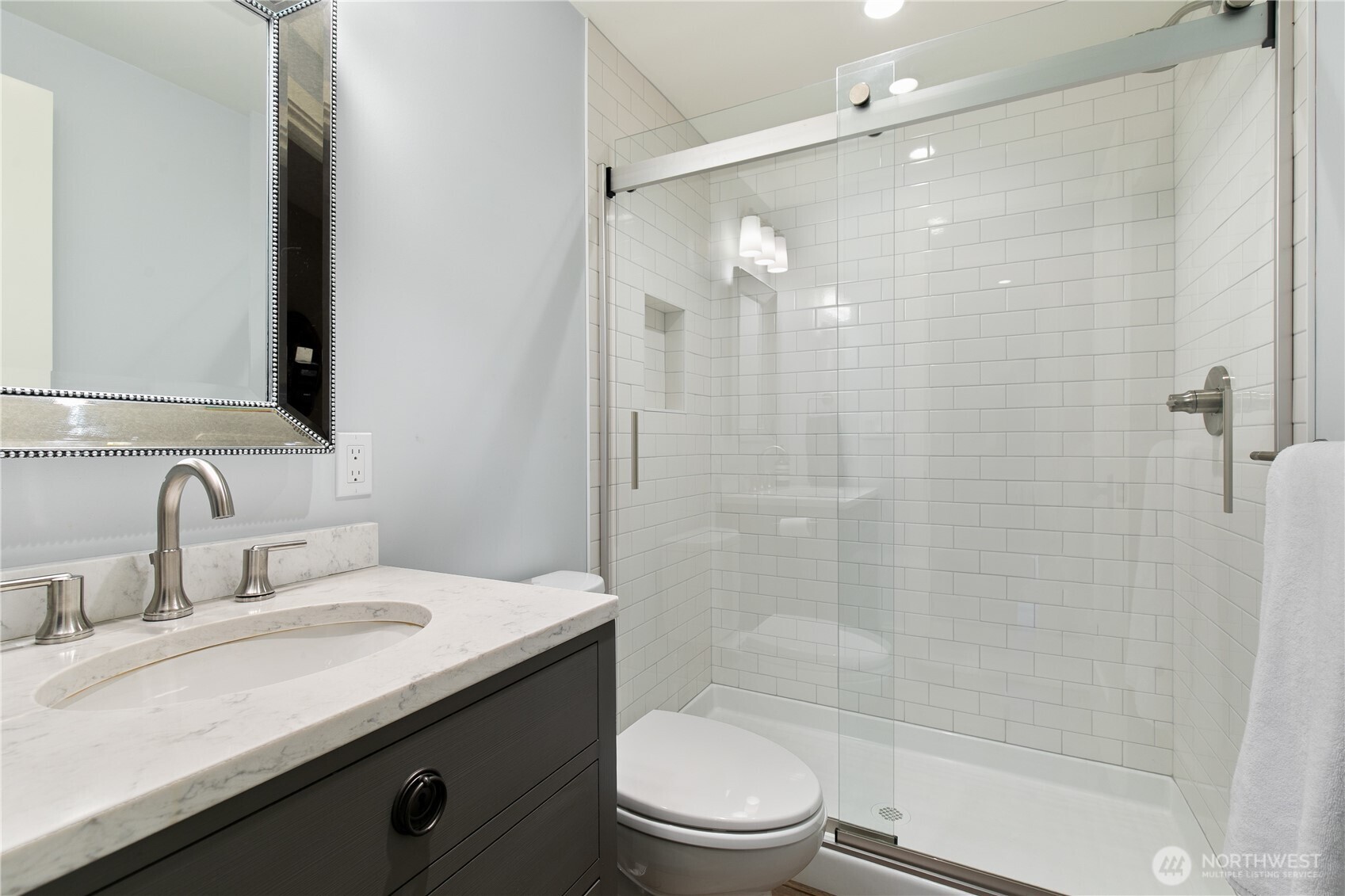 2816 South Hudson Street Seattle, WA 98108 - Photo 34 of 40 a bathroom with a sink a toilet and shower