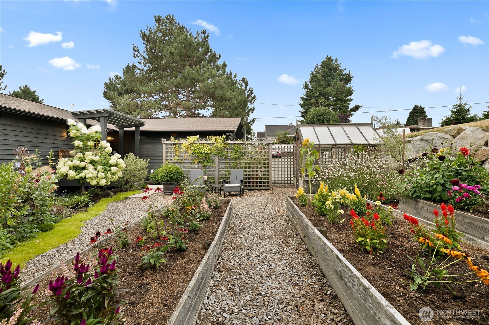 2816 South Hudson Street Seattle, WA 98108 - Photo 39 of 40 a view of a pathway with flower plants