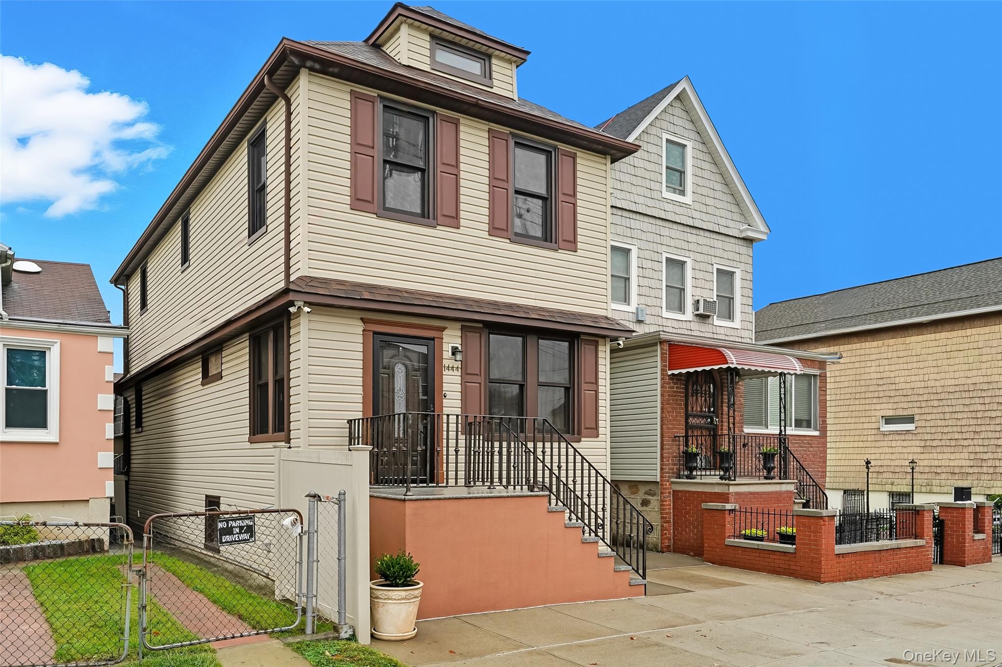 1444 Gillespie Avenue Bronx, NY 10461 - Photo 1 of 49 a front view of a house with a porch