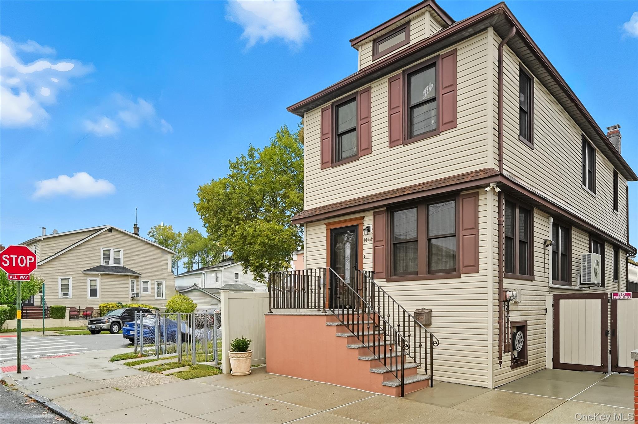 1444 Gillespie Avenue Bronx, NY 10461 - Photo 2 of 49 a front view of a house with a yard