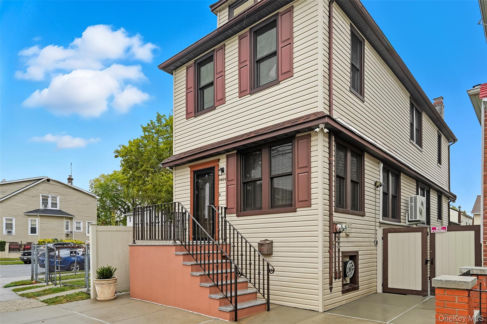 1444 Gillespie Avenue Bronx, NY 10461 - Photo 3 of 49 a front view of a house with a porch