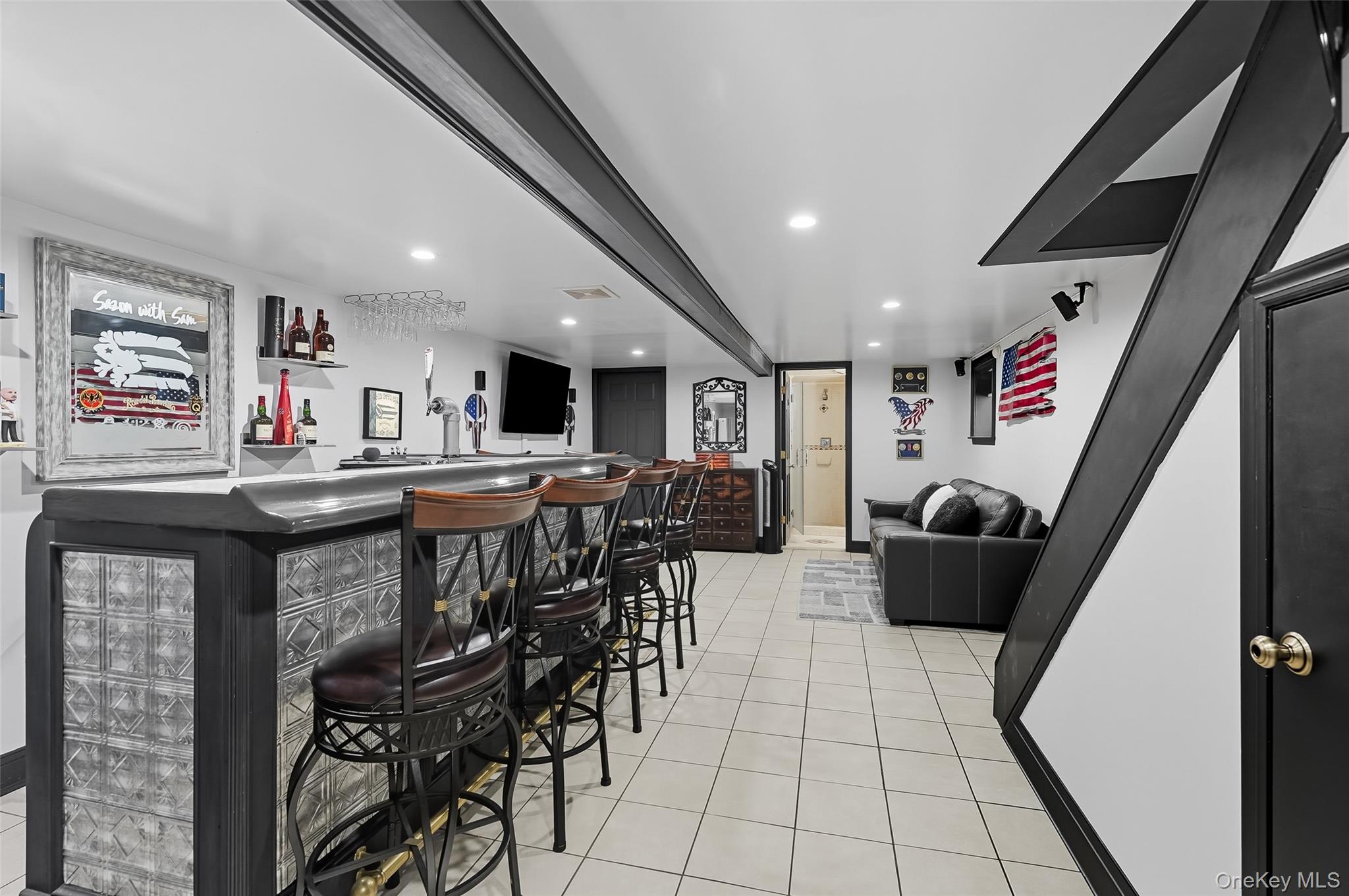 1444 Gillespie Avenue Bronx, NY 10461 - Photo 32 of 49 a living room with stainless steel appliances furniture a rug and a large window