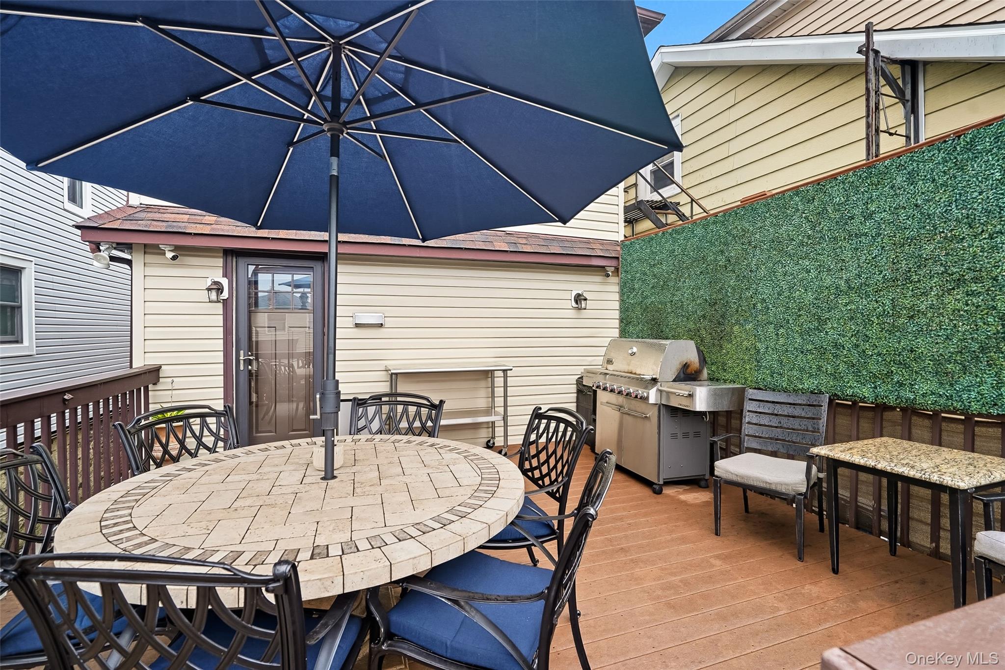 1444 Gillespie Avenue Bronx, NY 10461 - Photo 36 of 49 a table and chairs in the patio