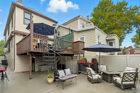 a view of a chairs and tables in patio