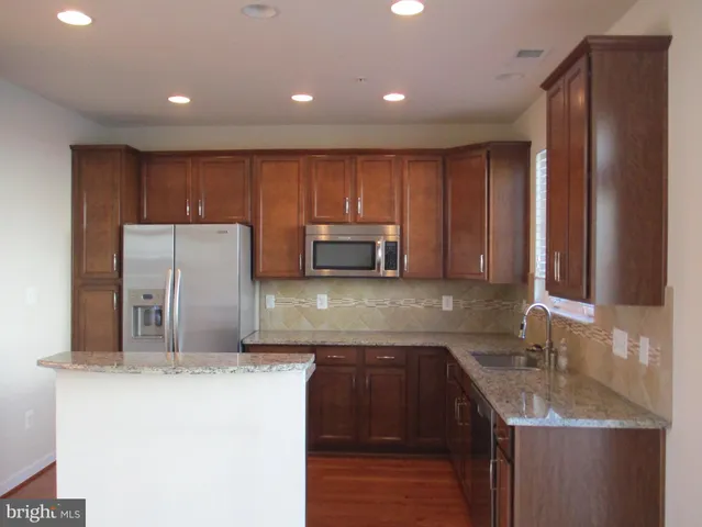 a view of a balcony with furniture