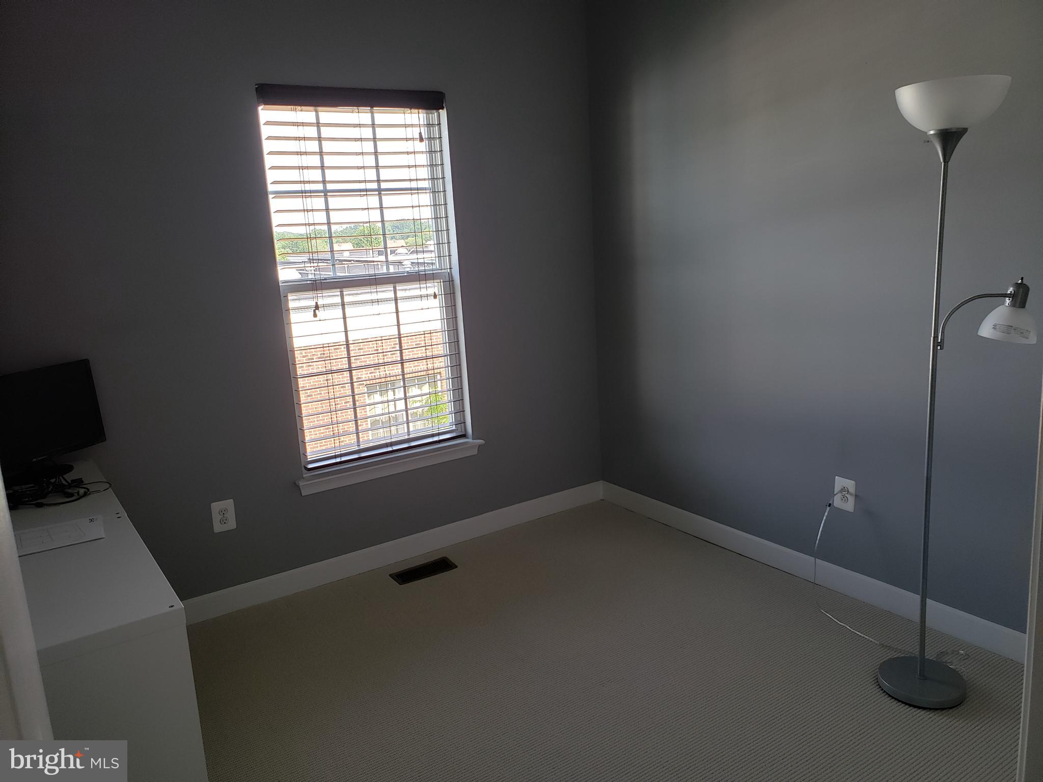 2144 Little Sorrel Way Silver Spring, MD 20902 - Photo 14 of 31 a view of an empty room with a window