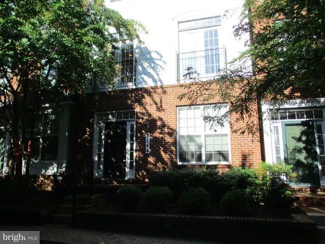 a view of a pathway with a patio