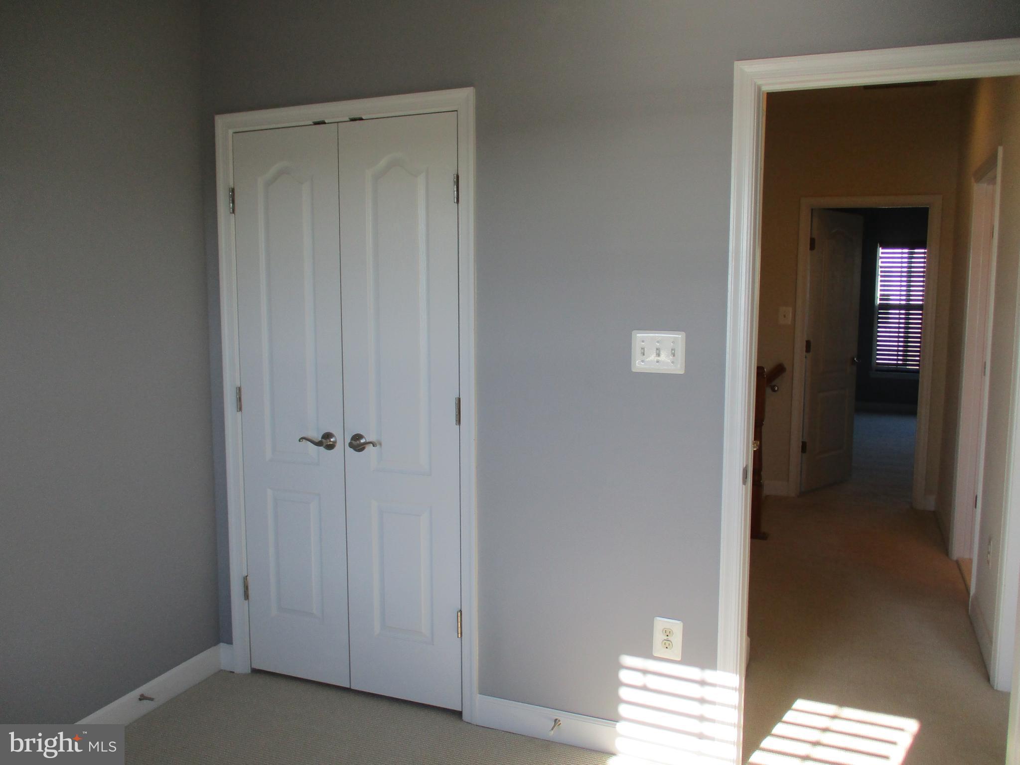 2144 Little Sorrel Way Silver Spring, MD 20902 - Photo 24 of 31 a view of room with window and closet