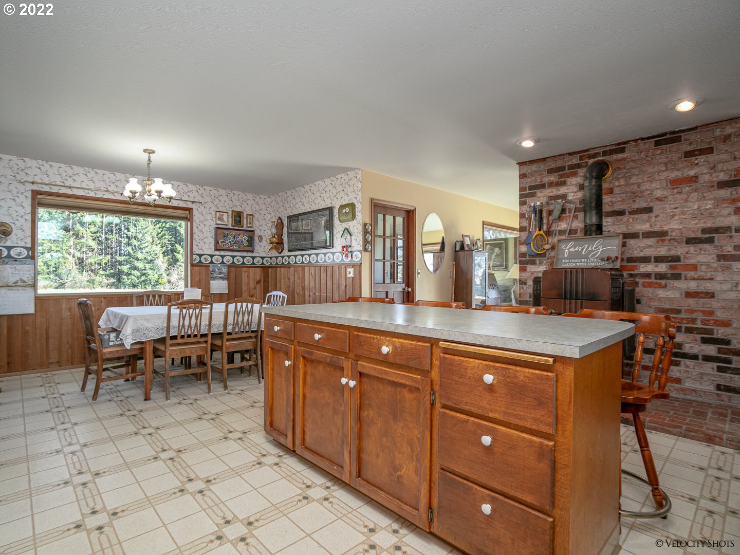 39240 Southeast Rude Road Sandy, OR 97055 - Photo 11 of 32 a kitchen with stainless steel appliances granite countertop a stove a sink and a refrigerator