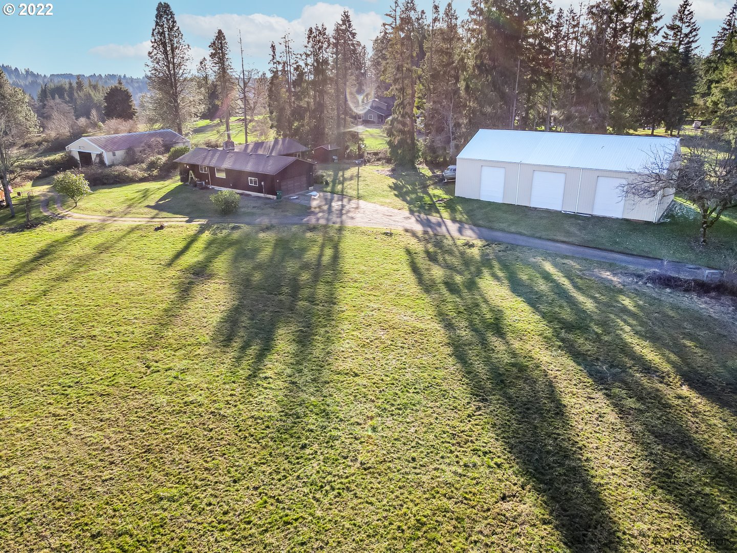 39240 Southeast Rude Road Sandy, OR 97055 - Photo 4 of 32 a swimming pool with outdoor seating and yard
