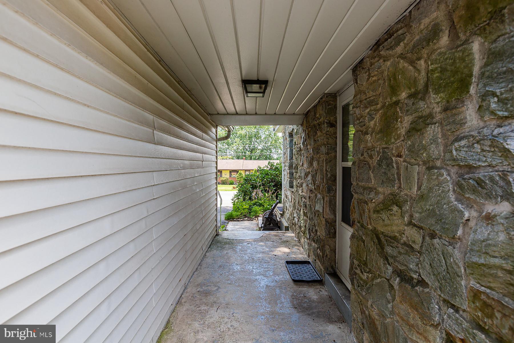2037 Stone Mill Road Lancaster, PA 17603 - Photo 69 of 72 covered breezeway between house and garage