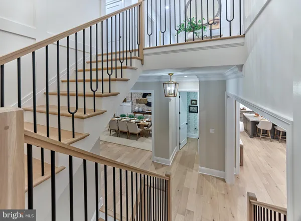 a view of a porch with wooden floor and stairs