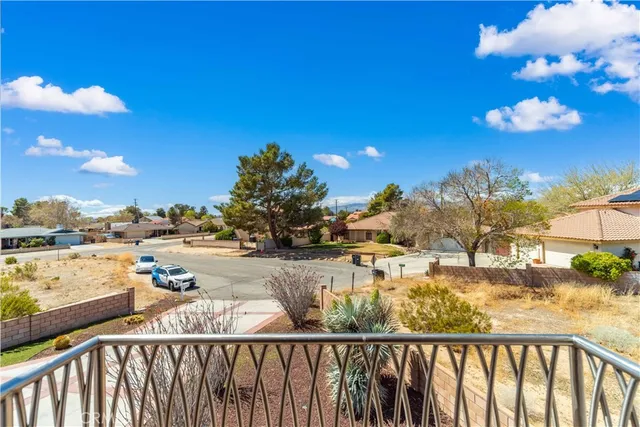 a view of swimming pool from a balcony