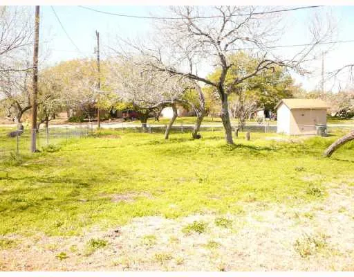 a view of an ocean with a mountain view