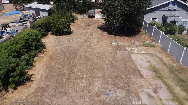 a view of outdoor space with trees all around