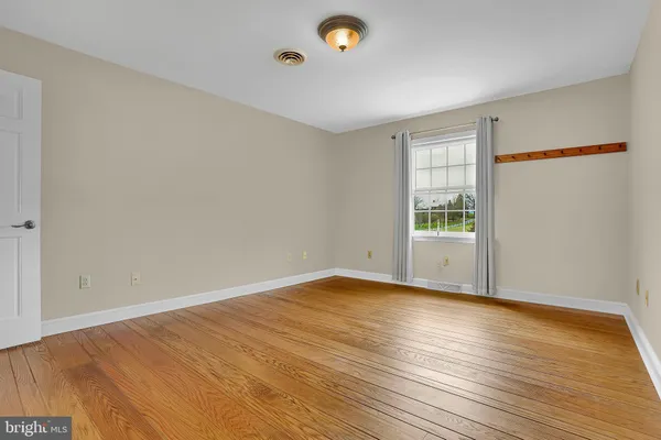 a utility room with cabinets washer and dryer