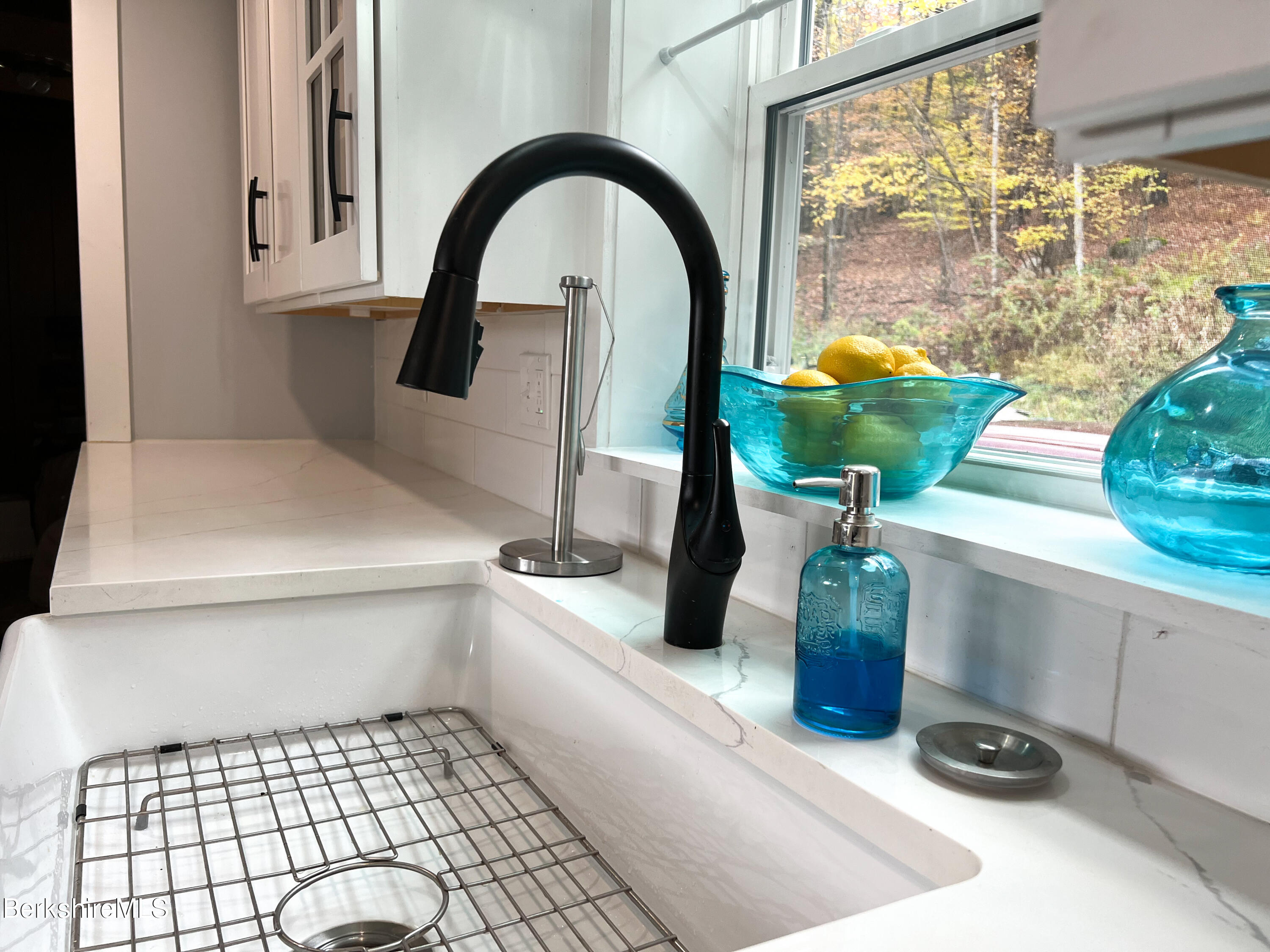 910 Daniels Road Clarksburg, MA 01247 - Photo 12 of 41 a kitchen with a sink and a window