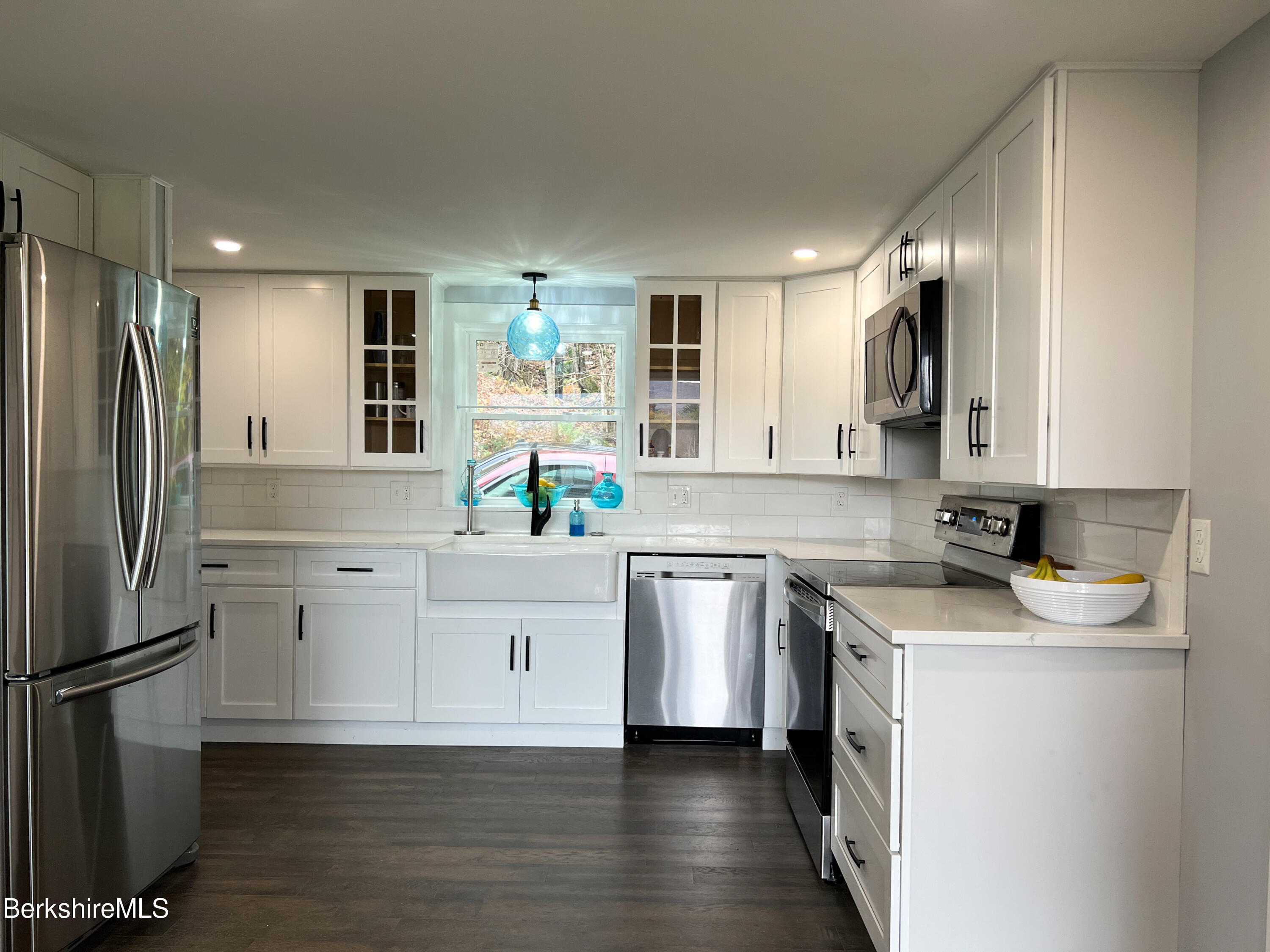 910 Daniels Road Clarksburg, MA 01247 - Photo 13 of 41 a kitchen with a sink stove and refrigerator