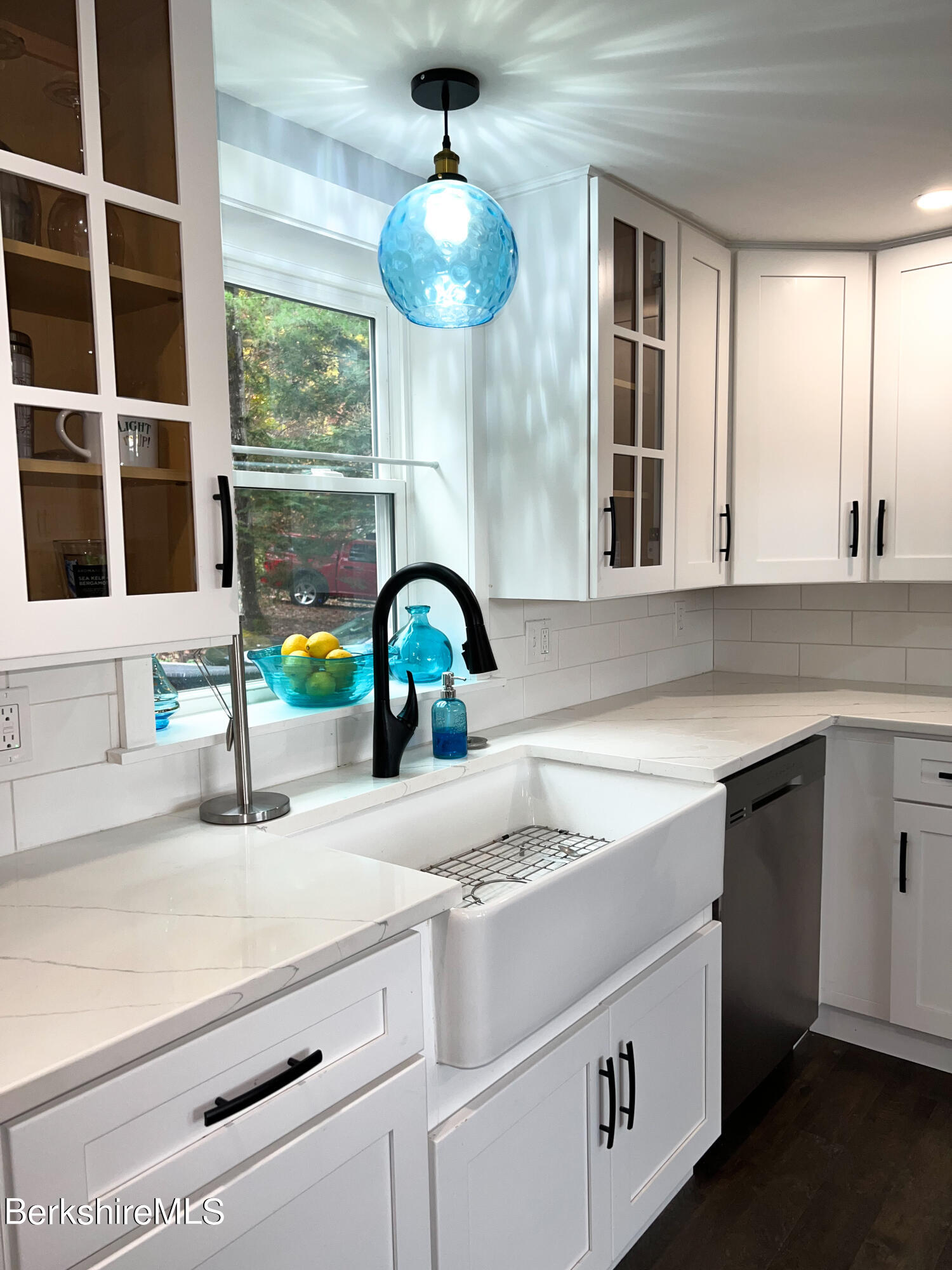 910 Daniels Road Clarksburg, MA 01247 - Photo 16 of 41 a kitchen with a sink and a large window