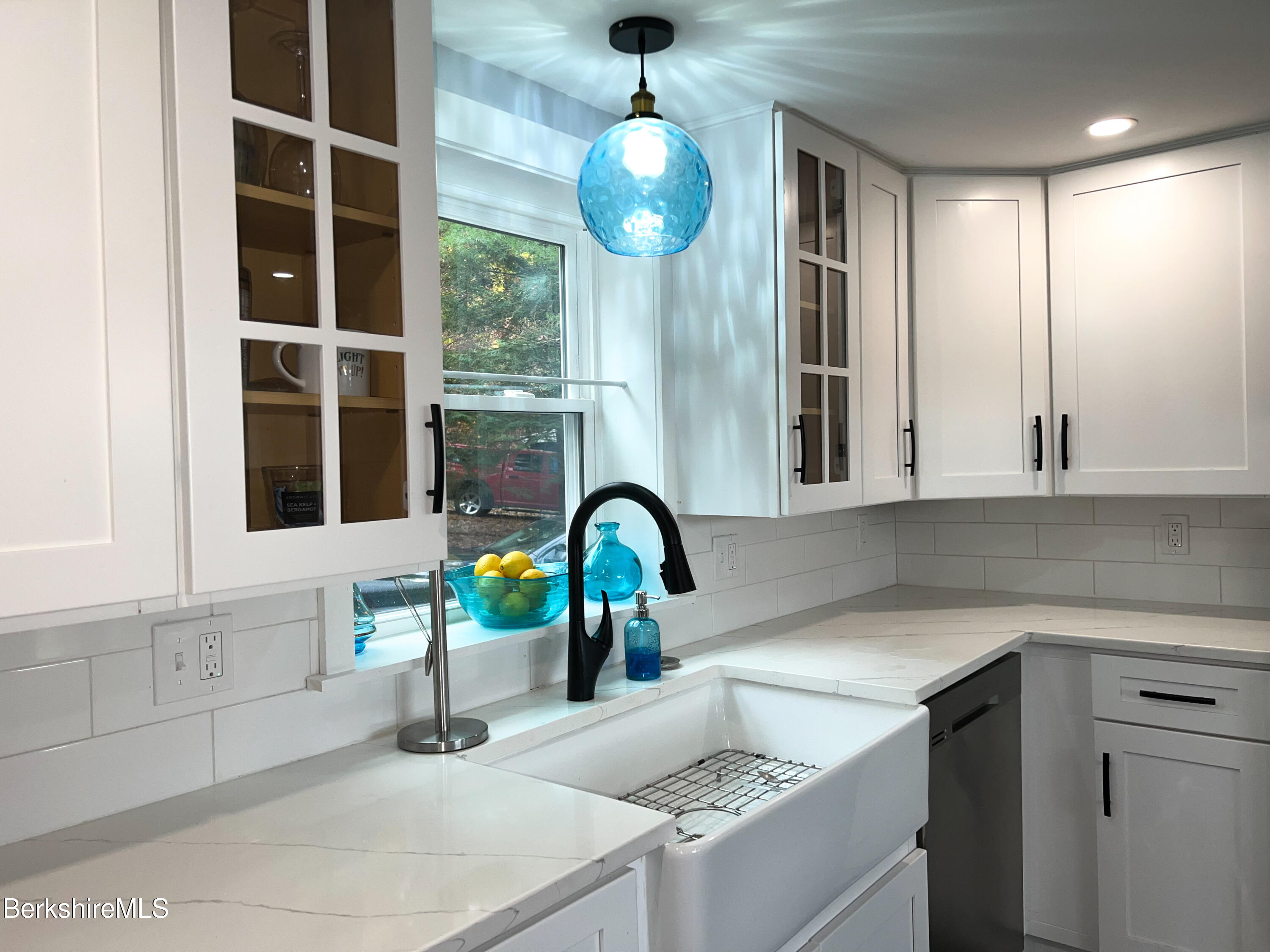 910 Daniels Road Clarksburg, MA 01247 - Photo 17 of 41 a kitchen with a sink and a window