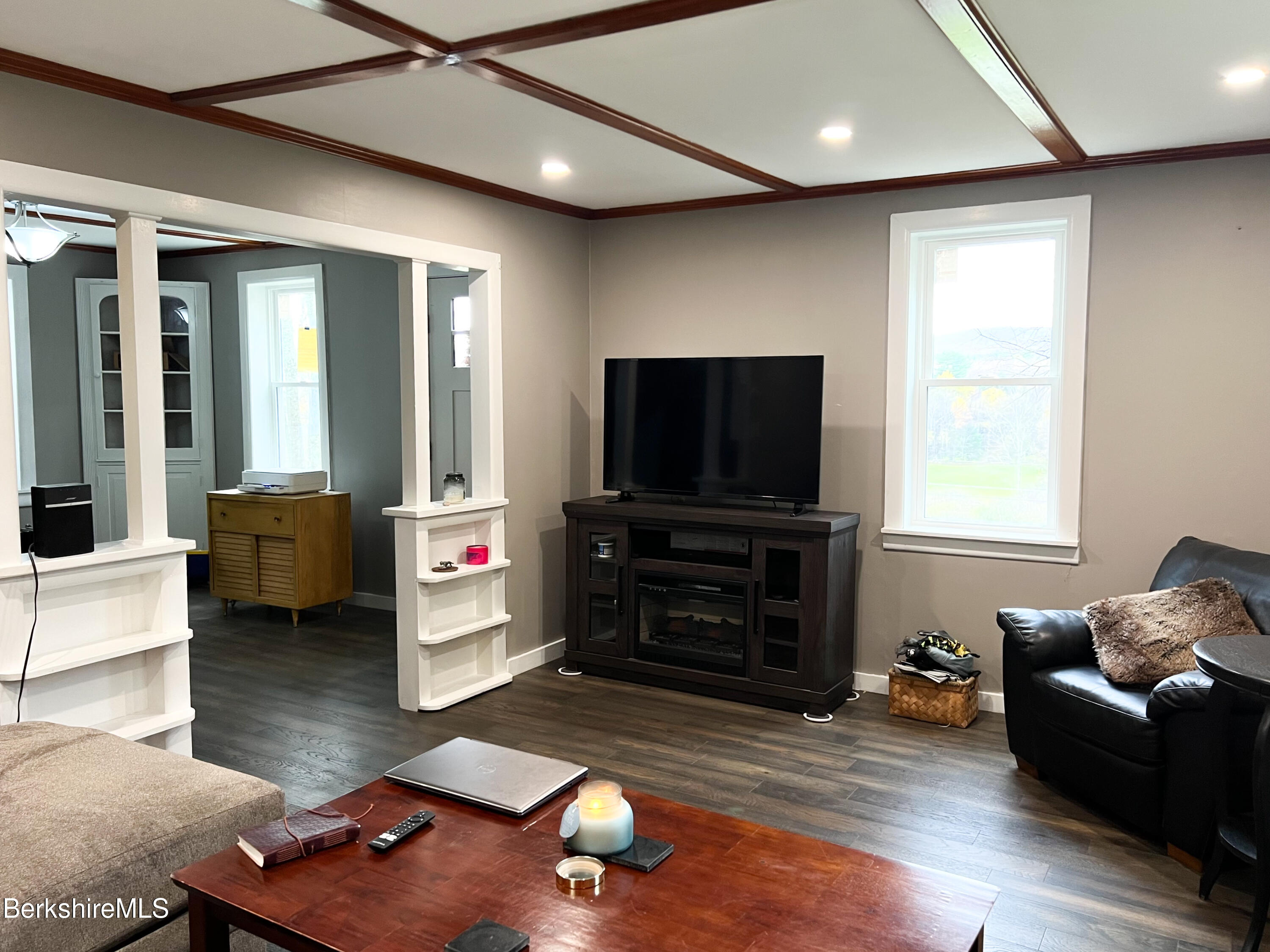 910 Daniels Road Clarksburg, MA 01247 - Photo 23 of 41 a living room with furniture and a flat screen tv