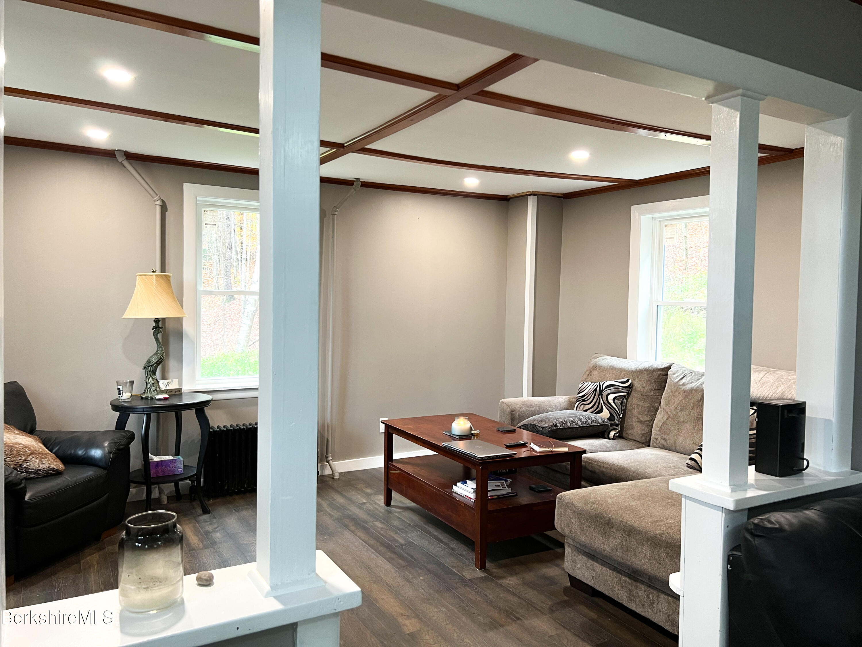910 Daniels Road Clarksburg, MA 01247 - Photo 25 of 41 a living room with furniture and a window