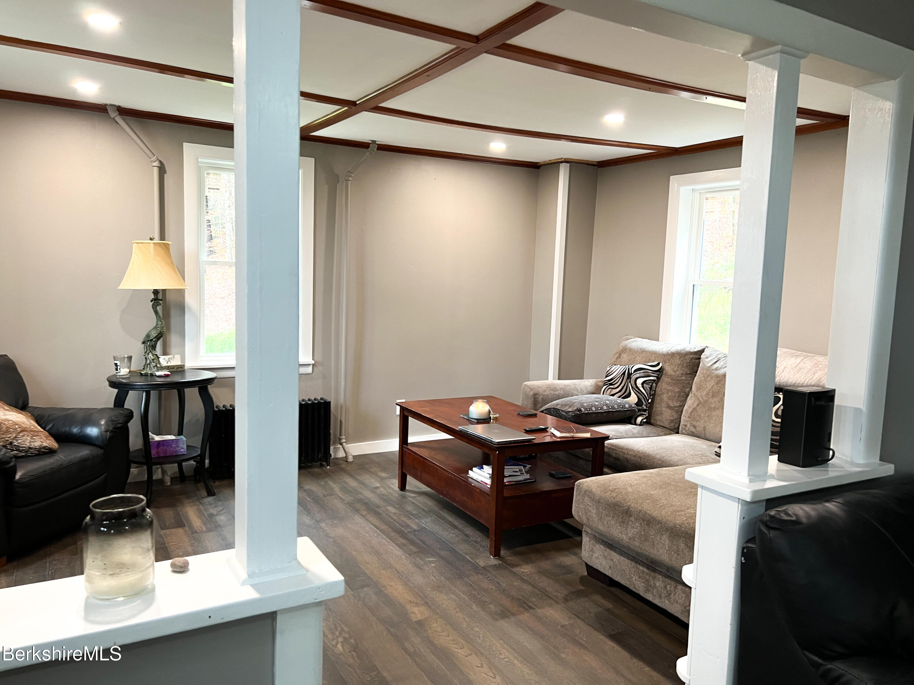 910 Daniels Road Clarksburg, MA 01247 - Photo 26 of 41 a living room with furniture and a wooden floor