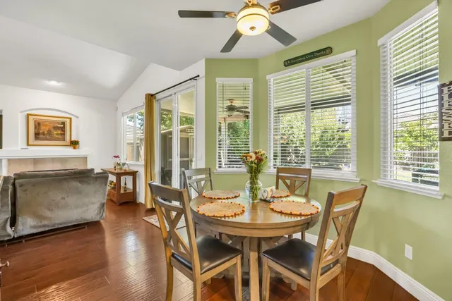 a kitchen with stainless steel appliances a sink a stove and cabinets