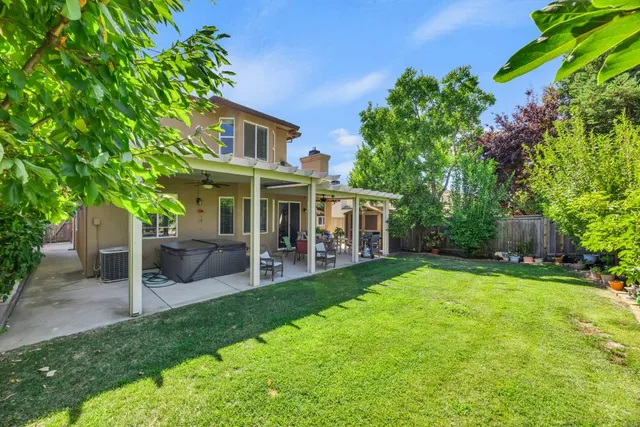 an aerial view of a swimming pool and outdoor space
