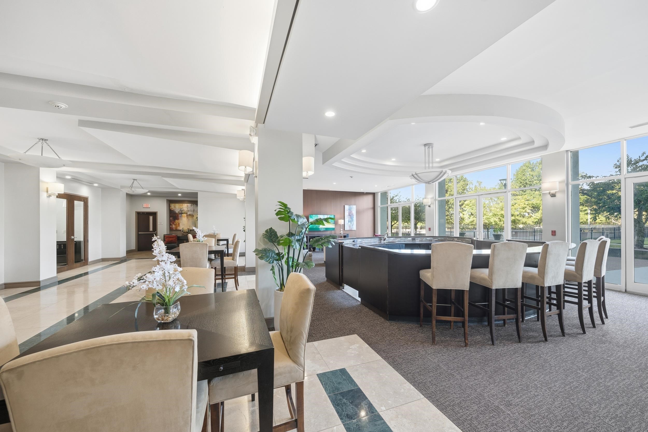 655 Riverside Drive, Unit 205A Memphis, TN 38103 - Photo 17 of 24 a view of a dining room with furniture window and outside view