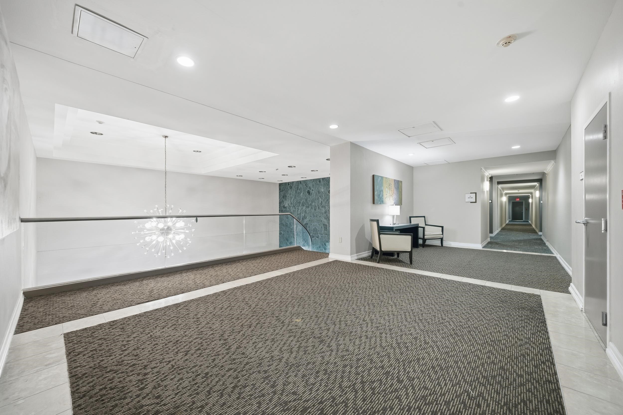 655 Riverside Drive, Unit 205A Memphis, TN 38103 - Photo 20 of 24 a view of a livingroom with furniture and an empty room
