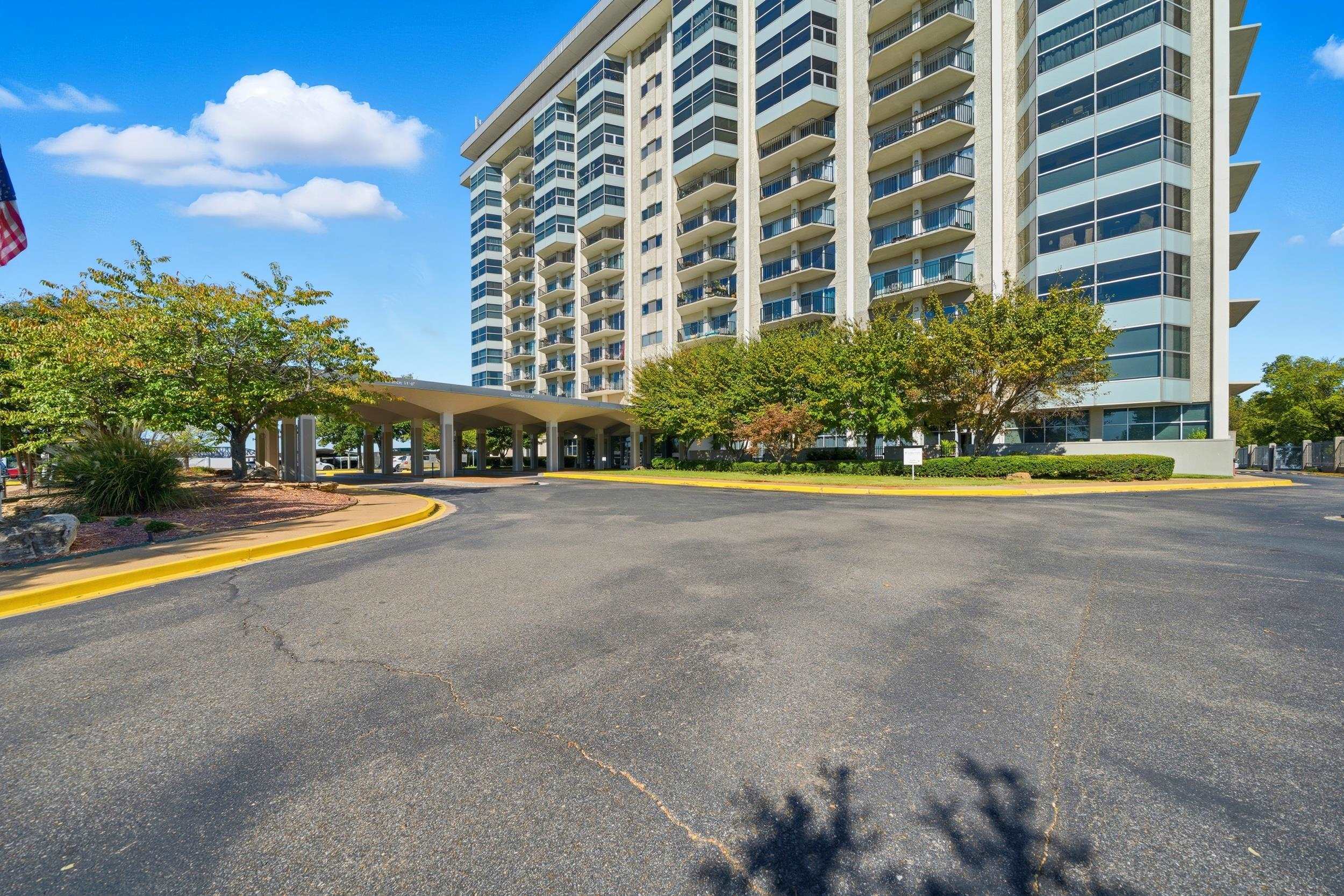 655 Riverside Drive, Unit 205A Memphis, TN 38103 - Photo 23 of 24 a view of building with yard and swimming pool