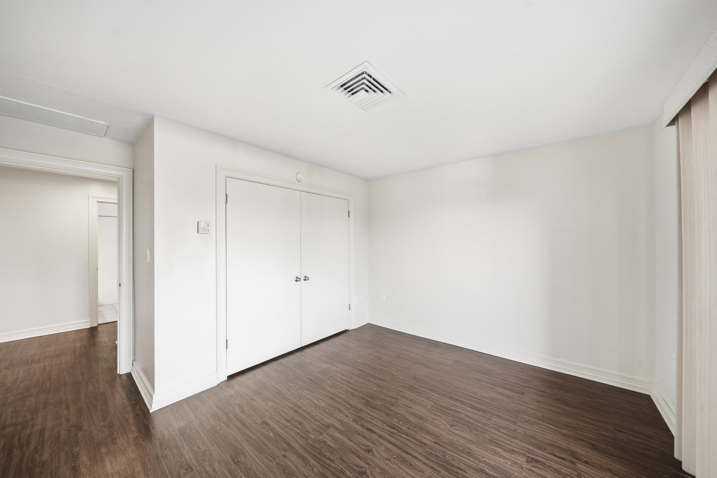 655 Riverside Drive, Unit 205A Memphis, TN 38103 - Photo 8 of 24 a view of a room with wooden floor