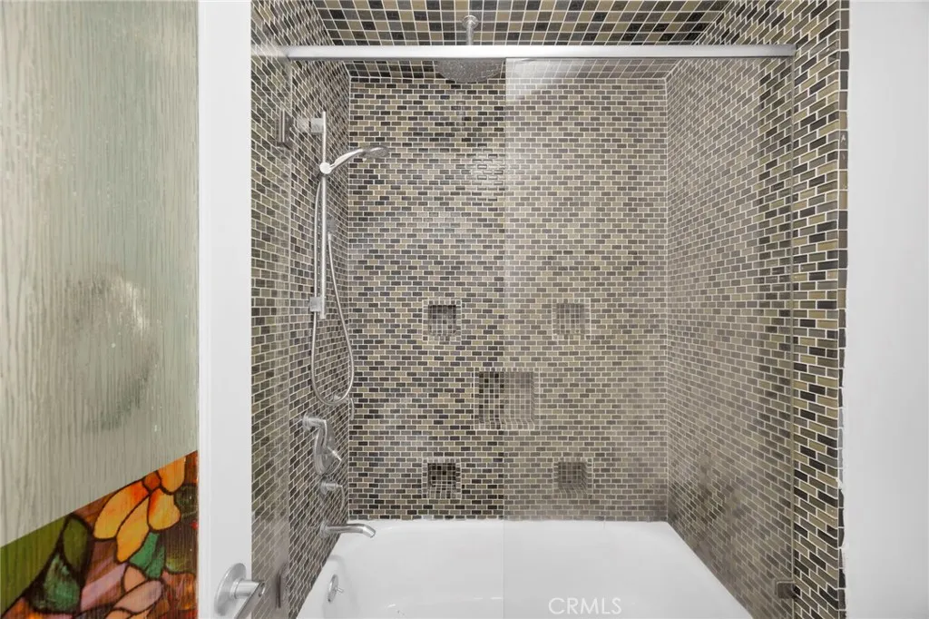 7890 East Spring Street, Unit 4A Long Beach, CA 90815 - Photo 15 of 21 a bathroom with a shower