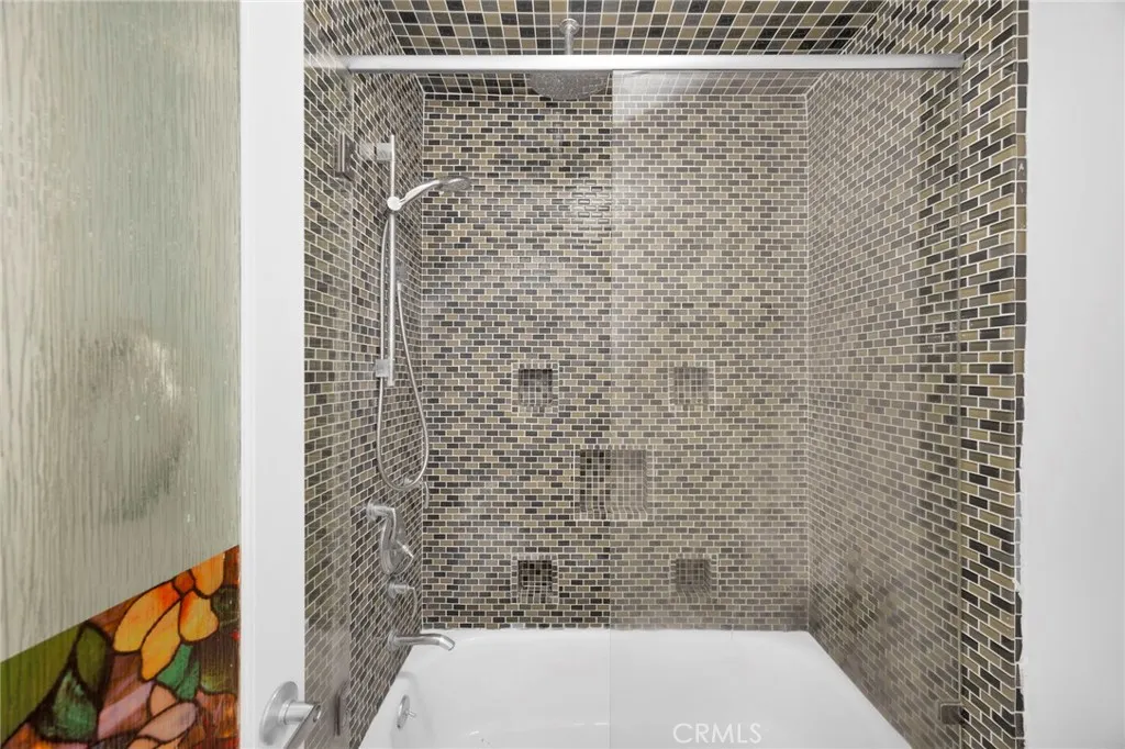 7890 East Spring Street, Unit 4A Long Beach, CA 90815 - Photo 15 of 21 a bathroom with a shower