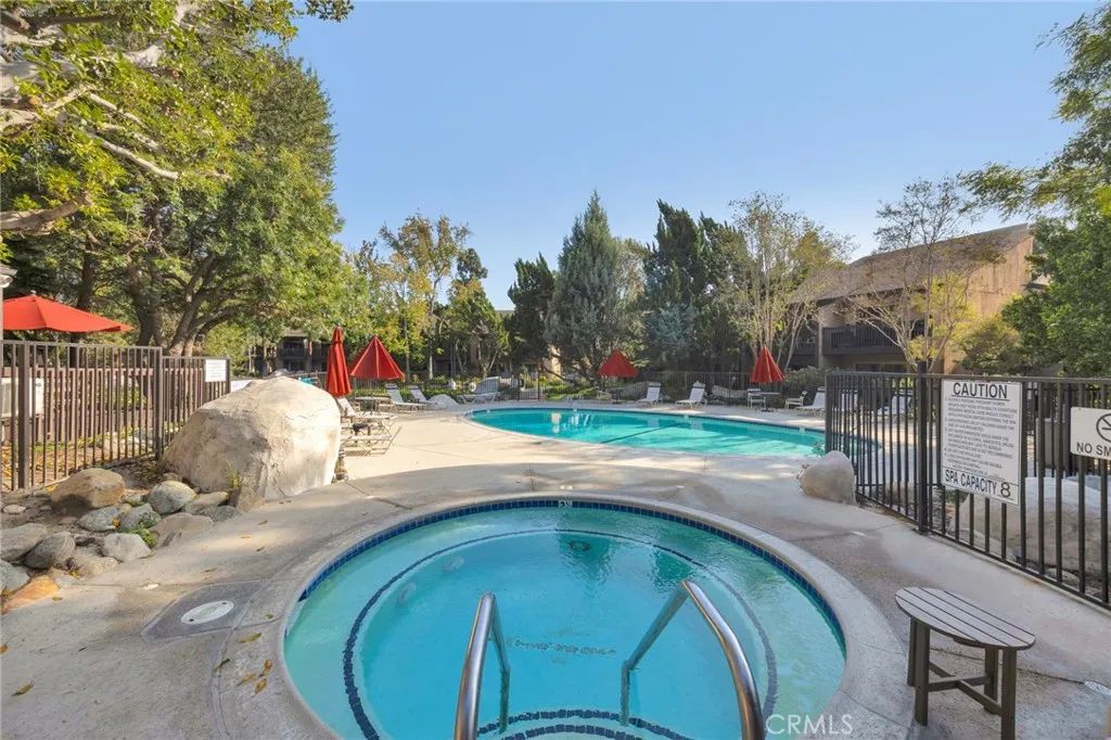 7890 East Spring Street, Unit 4A Long Beach, CA 90815 - Photo 18 of 21 a view of a backyard with sitting area