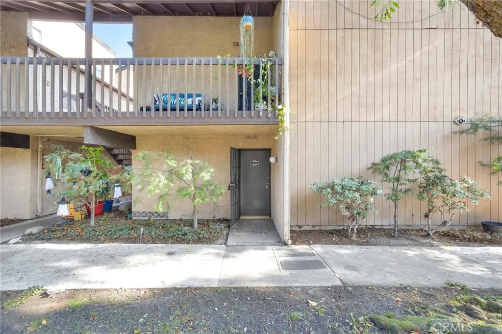 7890 East Spring Street, Unit 4A Long Beach, CA 90815 - Photo 7 of 21 a view of a street with potted plants