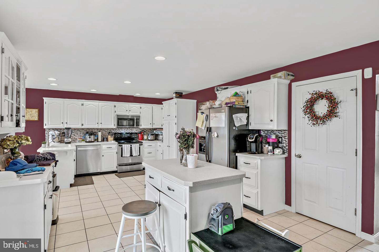 201 Sunbrook Drive Chambersburg, PA 17201 - Photo 33 of 42 a kitchen with white cabinets and refrigerator